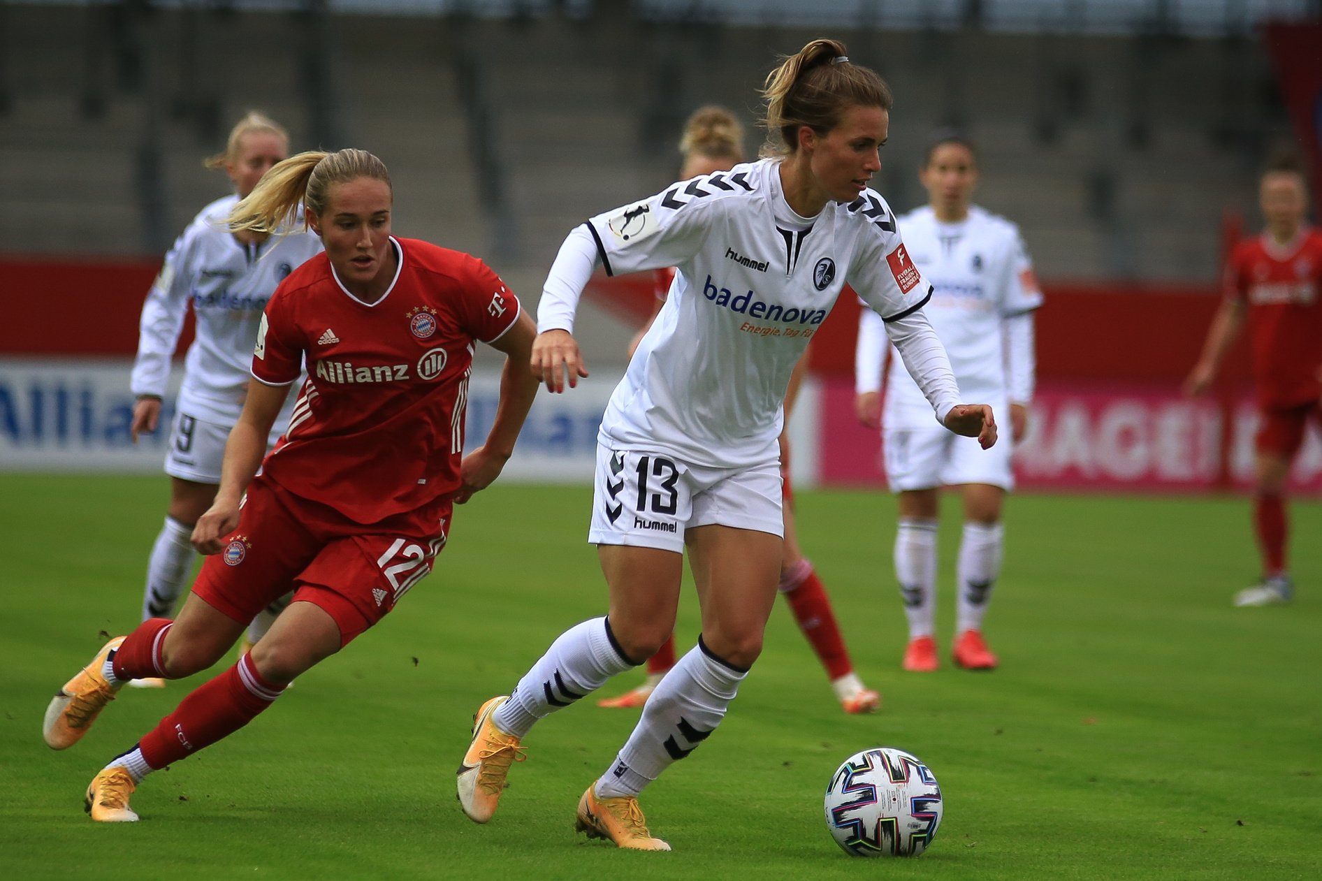 Photograph of Women Playing Soccer